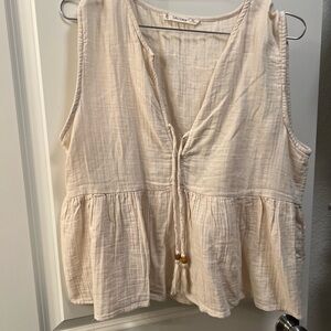 Cream Sleeveless Blouse with Tassel Accents
